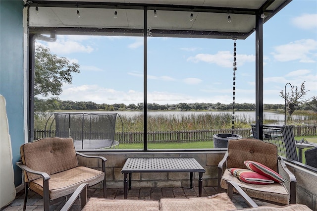 369 Bluff Lake Rd, Mascotte, FL 34753 - sunroom / solarium featuring a water view