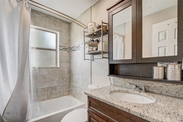 369 Bluff Lake Rd, Mascotte, FL 34753 - bathroom with vanity and shower / bathtub combination with curtain