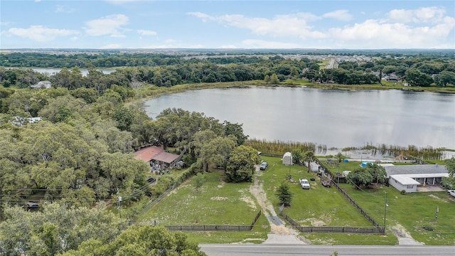 369 Bluff Lake Rd, Mascotte, FL 34753 - drone / aerial view of a nearby body of water and a heavily wooded area