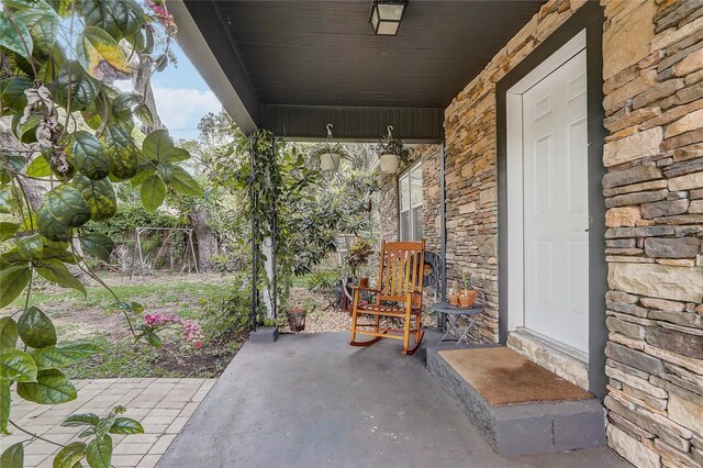369 Bluff Lake Rd, Mascotte, FL 34753 - view of covered porch