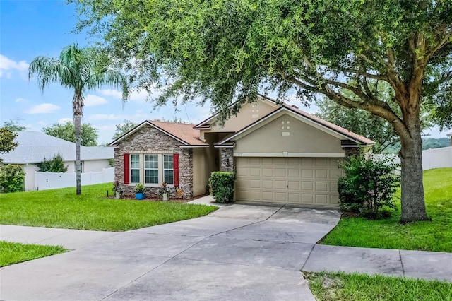 1112 Spruce Ridge Ct, Minneola, FL 34715 - single story home featuring stone siding, an attached garage, concrete driveway, and stucco siding