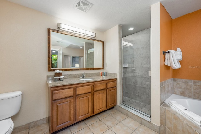 12527 Floridays Resort Dr Unit E104, Orlando, FL 32821 - bathroom featuring vanity, a bath, tile patterned floors, and a shower stall
