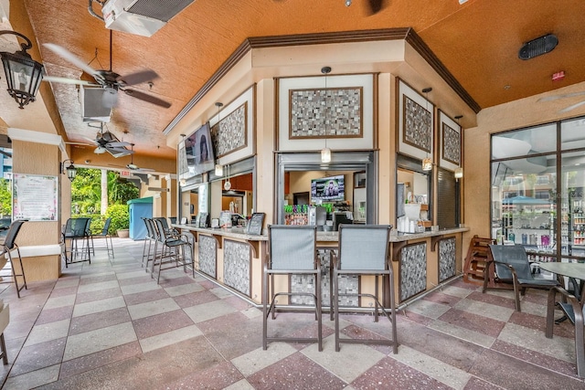 12527 Floridays Resort Dr Unit E104, Orlando, FL 32821 - view of patio / terrace with ceiling fan