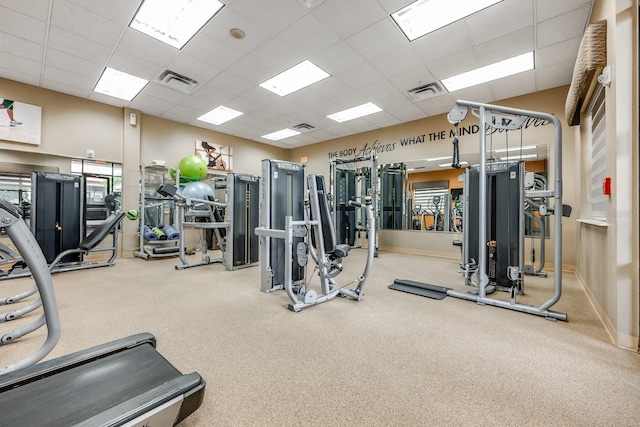 12527 Floridays Resort Dr Unit E104, Orlando, FL 32821 - gym with a paneled ceiling and carpet