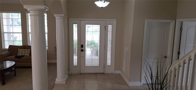 844 Suffolk Pl, Davenport, FL 33896 - foyer entrance featuring ornate columns and light tile patterned floors