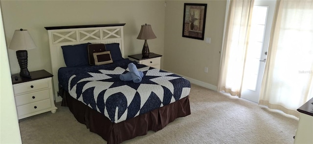 844 Suffolk Pl, Davenport, FL 33896 - bedroom with light colored carpet and baseboards