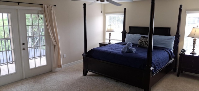 844 Suffolk Pl, Davenport, FL 33896 - bedroom with carpet, multiple windows, and access to exterior