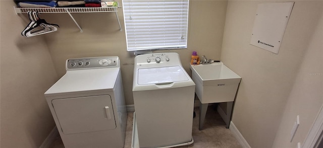 844 Suffolk Pl, Davenport, FL 33896 - washroom featuring washer and clothes dryer and electric panel