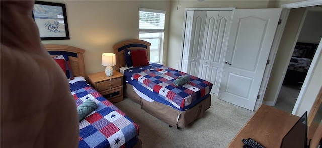 844 Suffolk Pl, Davenport, FL 33896 - bedroom with light carpet and a closet