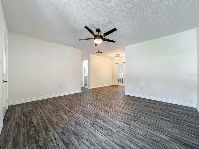 2109 Hartwell Ave, Sanford, FL 32771 - unfurnished room with dark wood-type flooring, ceiling fan, and a textured ceiling