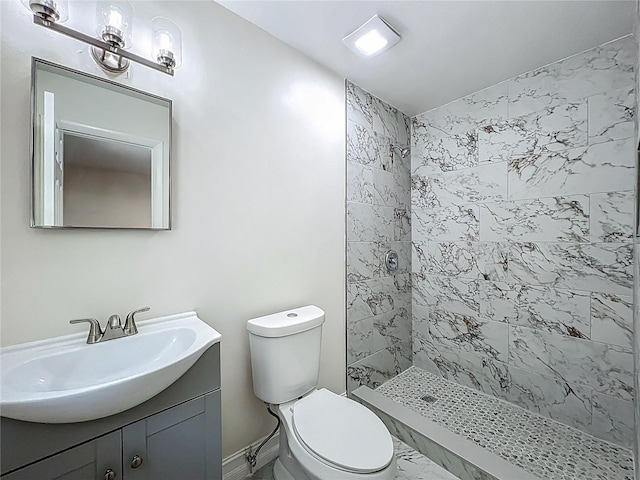 2109 Hartwell Ave, Sanford, FL 32771 - bathroom with tiled shower, vanity, and marble finish flooring