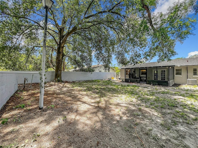 2109 Hartwell Ave, Sanford, FL 32771 - fenced backyard with a sunroom