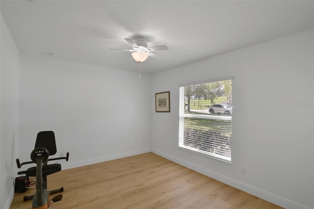 189 Blackstone Creek Rd, Groveland, FL 34736 - unfurnished office featuring light wood-style floors and a ceiling fan