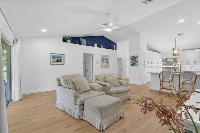 189 Blackstone Creek Rd, Groveland, FL 34736 - living area featuring ceiling fan, light wood-type flooring, high vaulted ceiling, and recessed lighting