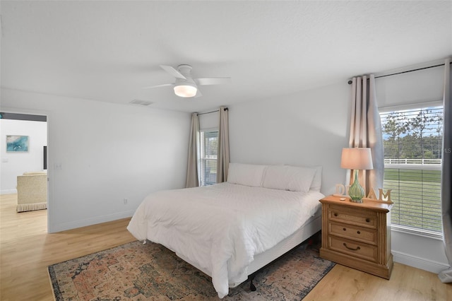 189 Blackstone Creek Rd, Groveland, FL 34736 - bedroom with light wood-style floors and a ceiling fan
