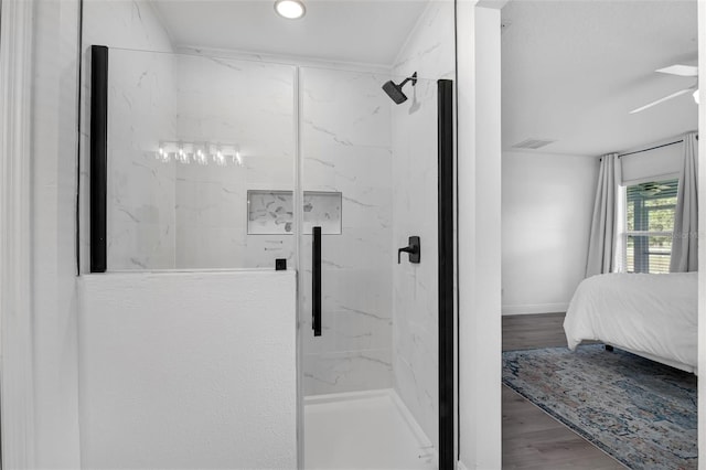189 Blackstone Creek Rd, Groveland, FL 34736 - bathroom featuring a marble finish shower, ensuite bathroom, wood finished floors, and recessed lighting