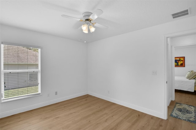 189 Blackstone Creek Rd, Groveland, FL 34736 - unfurnished room with light wood-style flooring and a ceiling fan