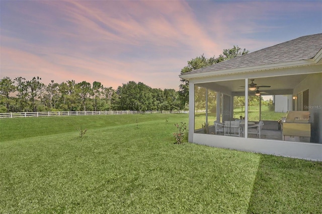 189 Blackstone Creek Rd, Groveland, FL 34736 - view of yard with a sunroom and ceiling fan