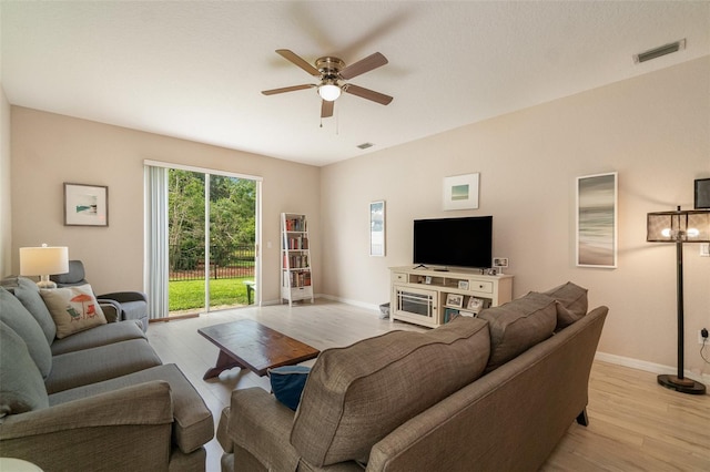 3896 Esplanade Ave, Port Orange, FL 32129 - living room with a ceiling fan and light wood finished floors