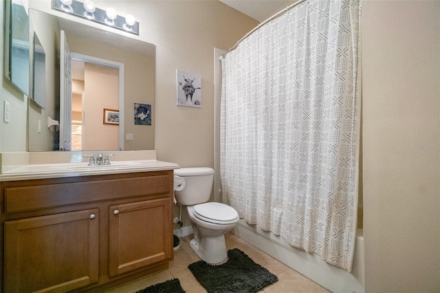 3896 Esplanade Ave, Port Orange, FL 32129 - bathroom with vanity, tile patterned flooring, and shower / bath combo with shower curtain