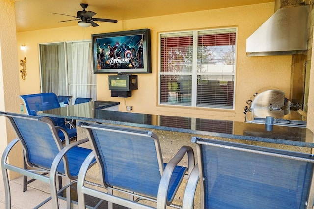 1428 Solana Cir, Davenport, FL 33897 - view of patio featuring ceiling fan and outdoor dining area