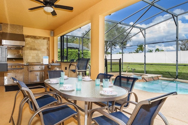 1428 Solana Cir, Davenport, FL 33897 - view of patio / terrace with exterior kitchen, ceiling fan, glass enclosure, a pool with connected hot tub, and outdoor dining space