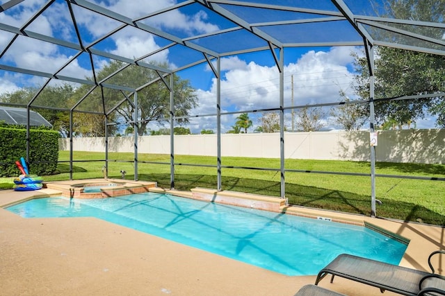 1428 Solana Cir, Davenport, FL 33897 - view of pool with glass enclosure, a pool with connected hot tub, and a patio area