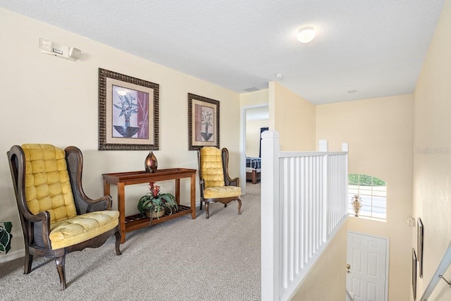 1428 Solana Cir, Davenport, FL 33897 - sitting room featuring carpet floors and an upstairs landing