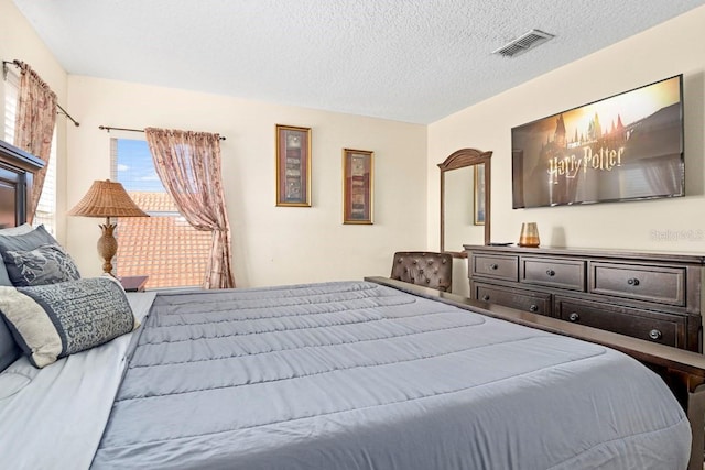 1428 Solana Cir, Davenport, FL 33897 - bedroom featuring a textured ceiling