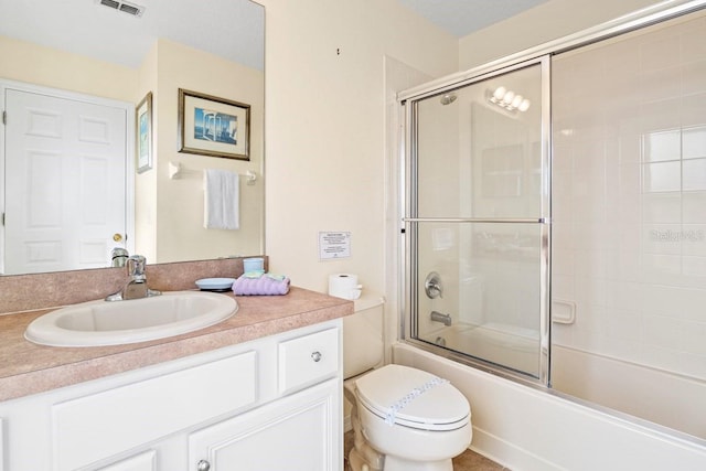 1428 Solana Cir, Davenport, FL 33897 - bathroom featuring vanity and combined bath / shower with glass door