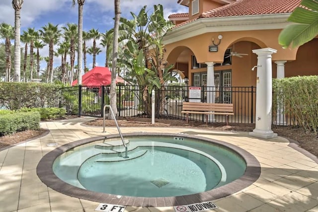 1428 Solana Cir, Davenport, FL 33897 - view of swimming pool featuring a hot tub