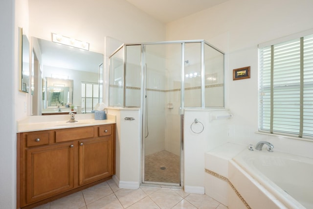 1646 Song Sparrow Ct, Sanford, FL 32773 - bathroom featuring a garden tub, healthy amount of natural light, a shower stall, and vanity