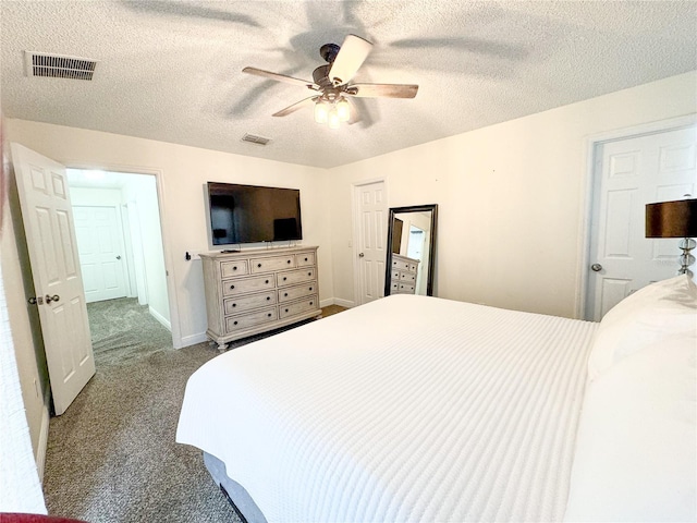 150 Barefoot Beach Way, Kissimmee, FL 34746 - bedroom featuring carpet floors, a textured ceiling, and a ceiling fan
