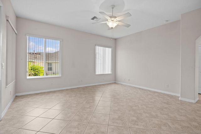 5339 Pond Crossing Pl, Leesburg, FL 34748 - spare room with a ceiling fan, plenty of natural light, and light tile patterned floors