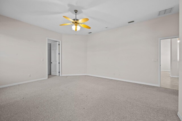 5339 Pond Crossing Pl, Leesburg, FL 34748 - empty room featuring carpet floors and a ceiling fan