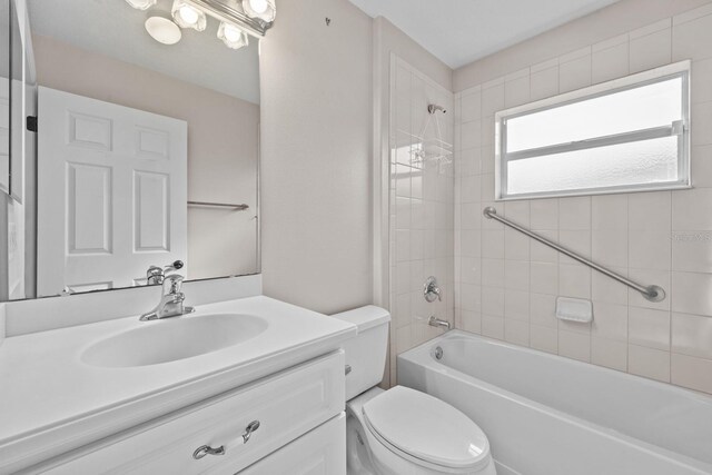 5339 Pond Crossing Pl, Leesburg, FL 34748 - bathroom featuring vanity and washtub / shower combination