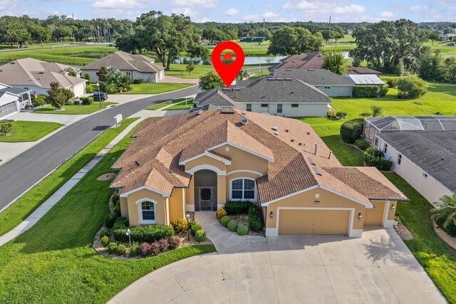 5339 Pond Crossing Pl, Leesburg, FL 34748 - aerial view of residential area with a nearby body of water