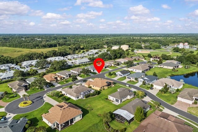 5339 Pond Crossing Pl, Leesburg, FL 34748 - aerial view of property and surrounding area with a large body of water and nearby suburban area