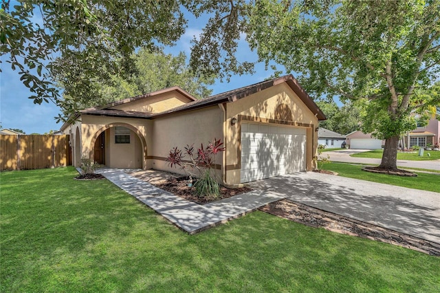 2935 Canoe Cir, Saint Cloud, FL 34772 - view of front of house with concrete driveway, a garage, and stucco siding