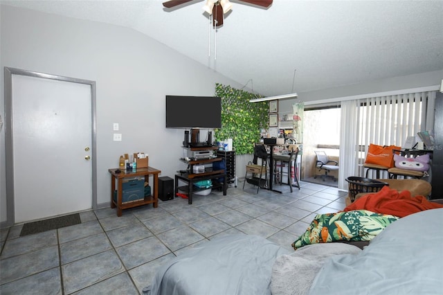 5027 Vineland Rd Unit 5027, Orlando, FL 32811 - tiled bedroom with lofted ceiling