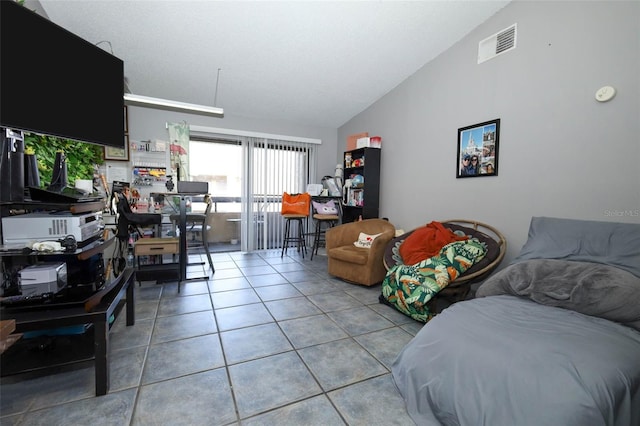 5027 Vineland Rd Unit 5027, Orlando, FL 32811 - tiled living room with vaulted ceiling