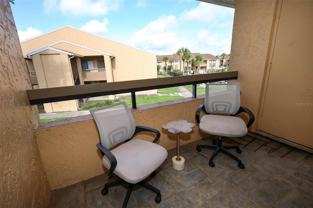 5027 Vineland Rd Unit 5027, Orlando, FL 32811 - balcony featuring a residential view