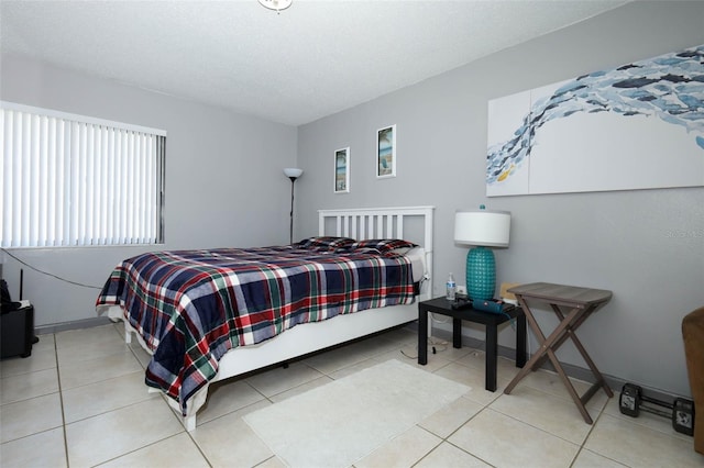5027 Vineland Rd Unit 5027, Orlando, FL 32811 - bedroom with tile patterned flooring
