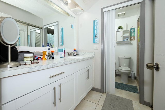 5027 Vineland Rd Unit 5027, Orlando, FL 32811 - bathroom featuring vanity and tile patterned flooring