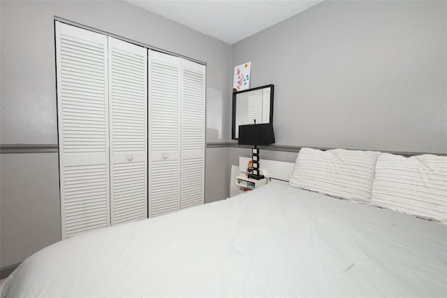 5027 Vineland Rd Unit 5027, Orlando, FL 32811 - bedroom featuring a closet