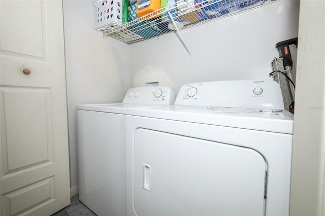 5027 Vineland Rd Unit 5027, Orlando, FL 32811 - washroom featuring separate washer and dryer