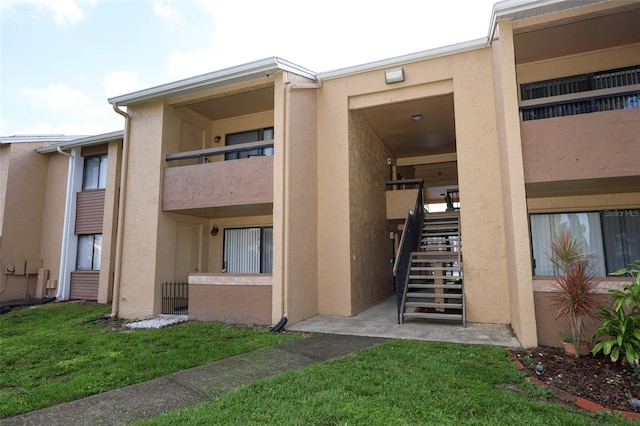 5027 Vineland Rd Unit 5027, Orlando, FL 32811 - view of building exterior with stairs