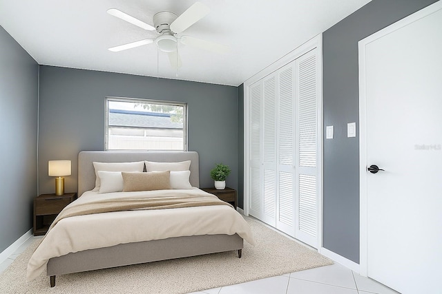 3417 Pershing Ave, Orlando, FL 32812 - tiled bedroom with a closet and ceiling fan