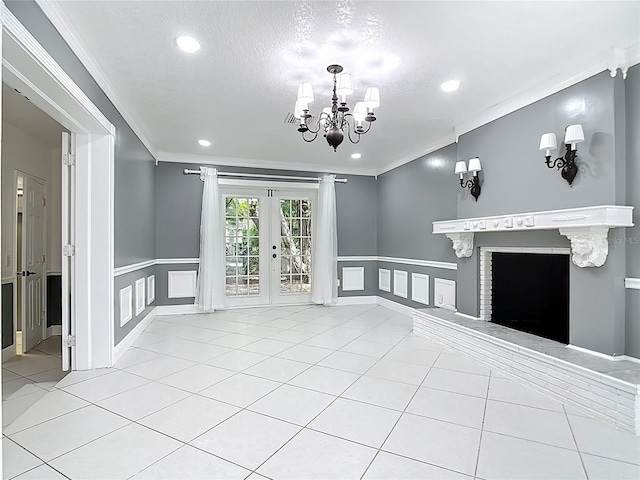 3417 Pershing Ave, Orlando, FL 32812 - unfurnished living room featuring french doors, ornamental molding, a chandelier, wainscoting, and recessed lighting
