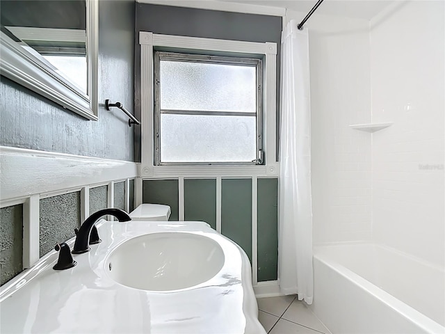 3417 Pershing Ave, Orlando, FL 32812 - full bath featuring shower / bath combination with curtain and tile patterned flooring